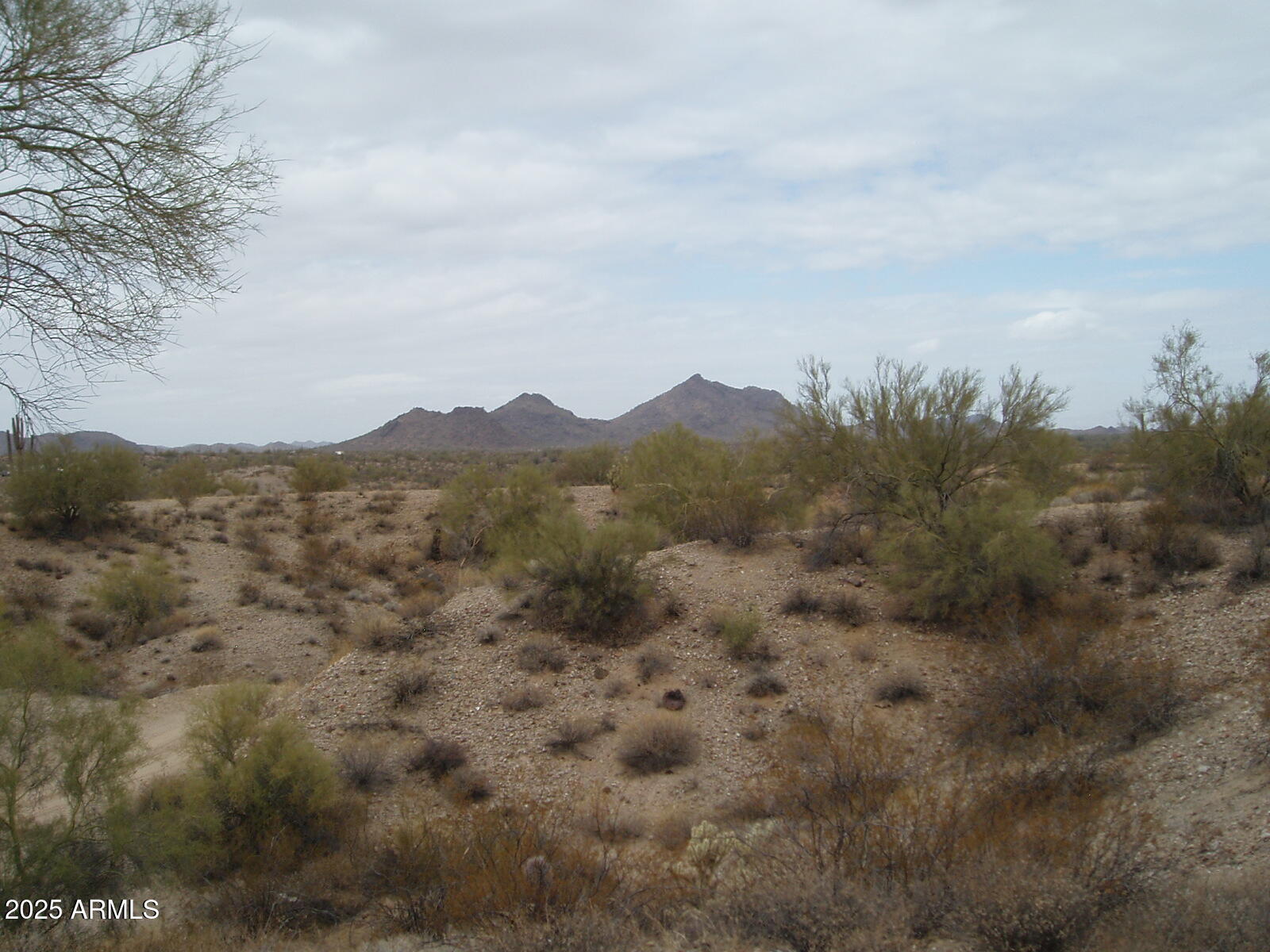 28700 West Dove Valley Road, Unit 6 PARCELS Wittmann, AZ 85361 - Photo 2 of 11 a view of a city with mountains in the background