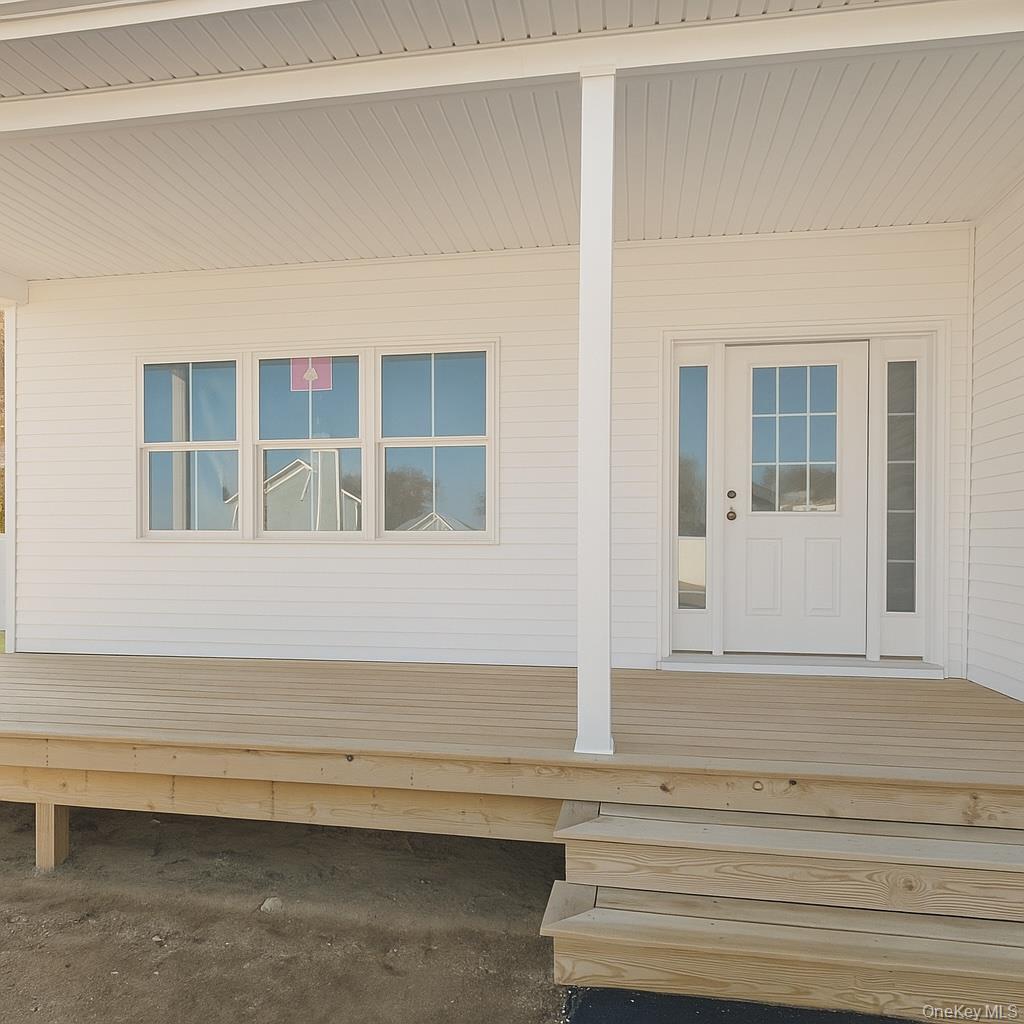 12 Fox Run Court Ridge, NY 11961 - Photo 5 of 11 a view of front door of house