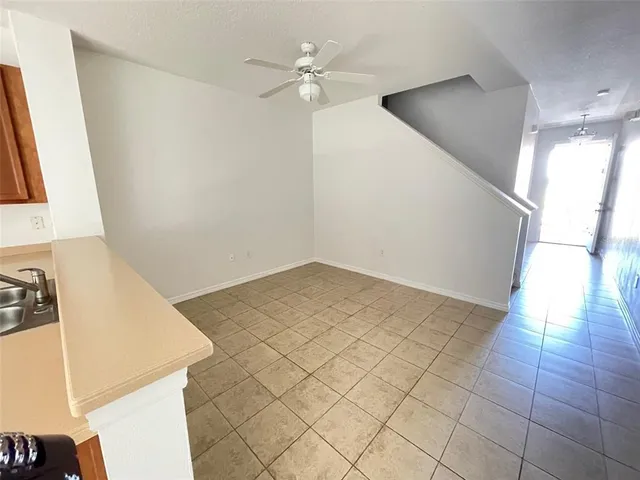 a view of a room with a fireplace