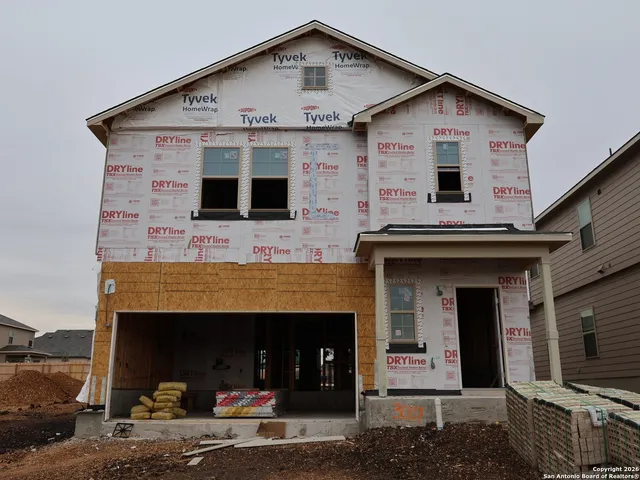a view of a hallway with windows