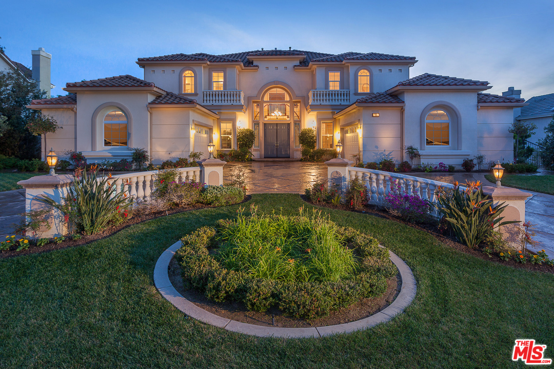12090 Nelson Road Moorpark, CA 93021 - Photo 1 of 54 a front view of a house with garden