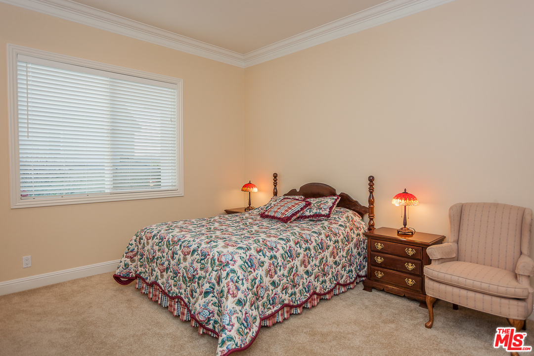 12090 Nelson Road Moorpark, CA 93021 - Photo 20 of 54 a bedroom with a bed and a couch