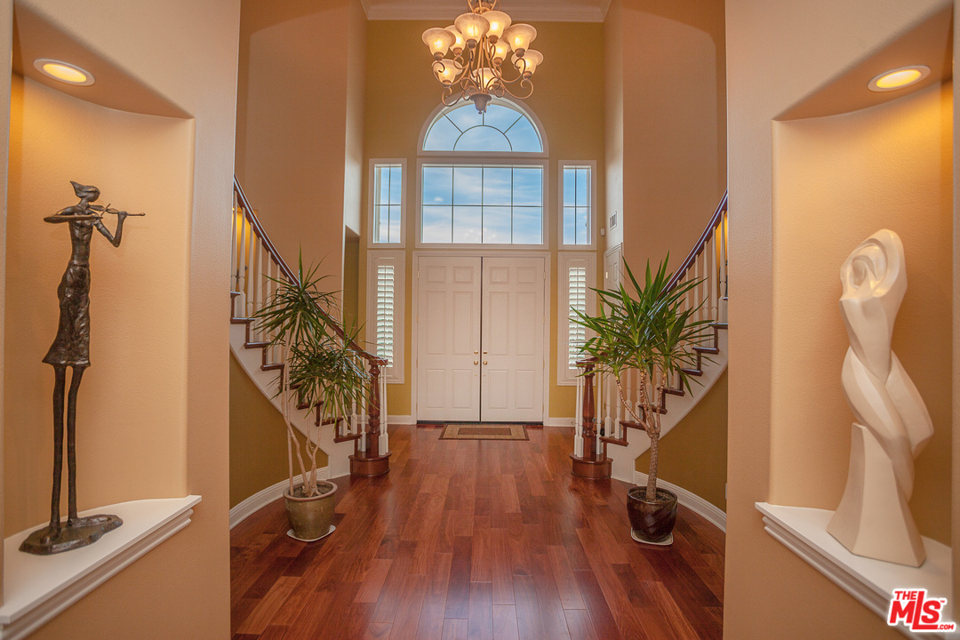 12090 Nelson Road Moorpark, CA 93021 - Photo 3 of 54 a view of a room with wooden floor and windows
