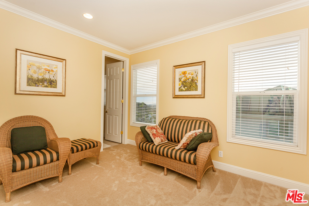 12090 Nelson Road Moorpark, CA 93021 - Photo 25 of 54 a spacious bedroom with a couch and a couch
