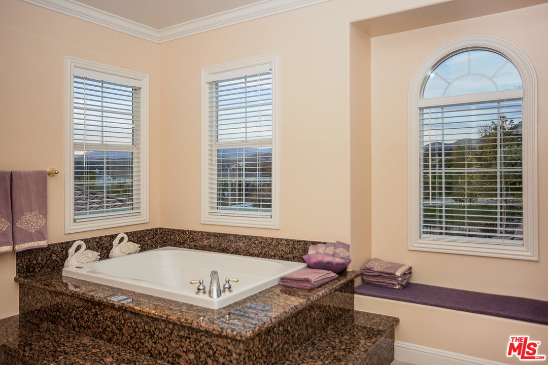 12090 Nelson Road Moorpark, CA 93021 - Photo 33 of 54 a bath tub sitting in front of a window
