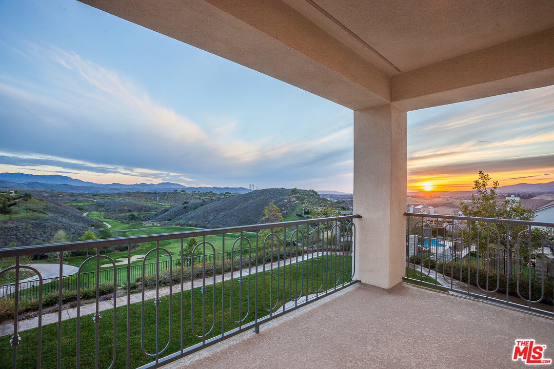 12090 Nelson Road Moorpark, CA 93021 - Photo 37 of 54 a view of a city and mountain from a balcony