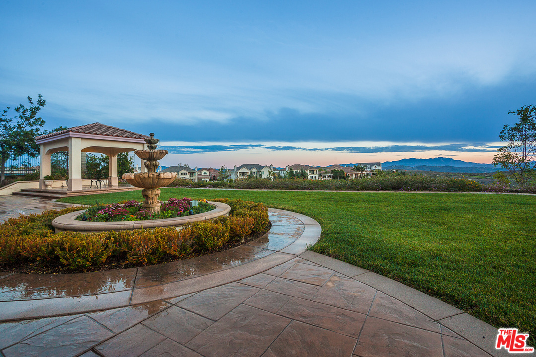 12090 Nelson Road Moorpark, CA 93021 - Photo 43 of 54 a view of a house with a yard