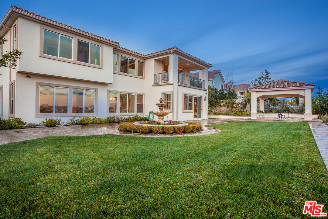 12090 Nelson Road Moorpark, CA 93021 - Photo 44 of 54 a front view of a building with a yard