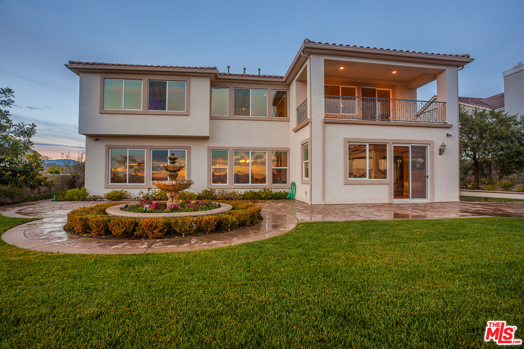 12090 Nelson Road Moorpark, CA 93021 - Photo 45 of 54 a front view of a house with a yard
