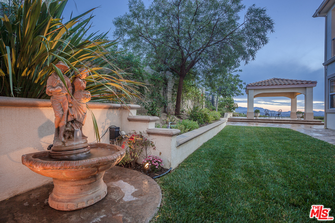 12090 Nelson Road Moorpark, CA 93021 - Photo 48 of 54 a view of a garden with a fountain
