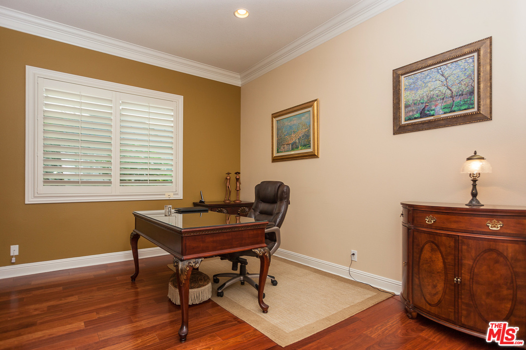 12090 Nelson Road Moorpark, CA 93021 - Photo 9 of 54 a view of a workspace with furniture and a window