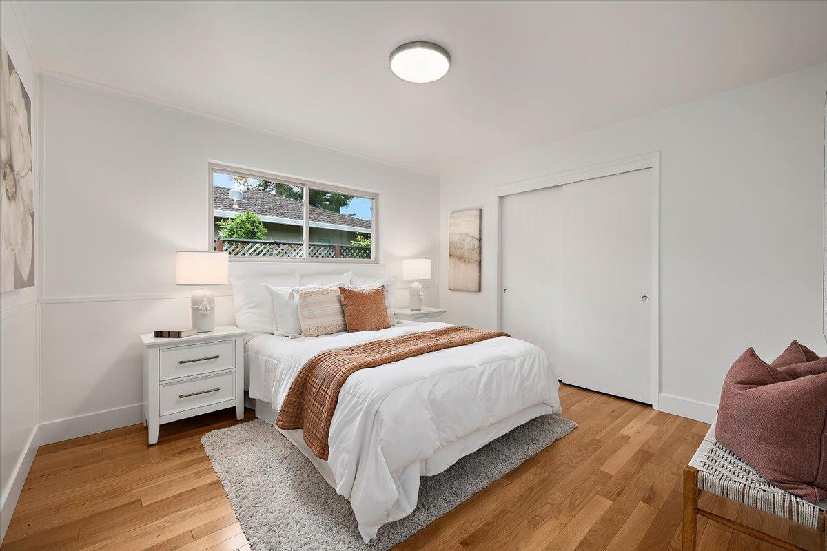 216 Montclair Road Los Gatos, CA 95032 - Photo 17 of 44 a bedroom with a bed and a window