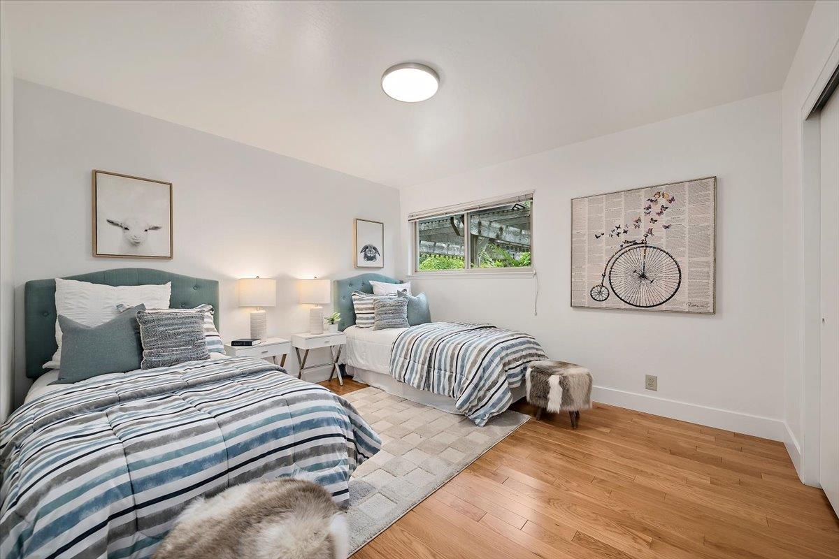 216 Montclair Road Los Gatos, CA 95032 - Photo 19 of 44 a bedroom with bed and a window
