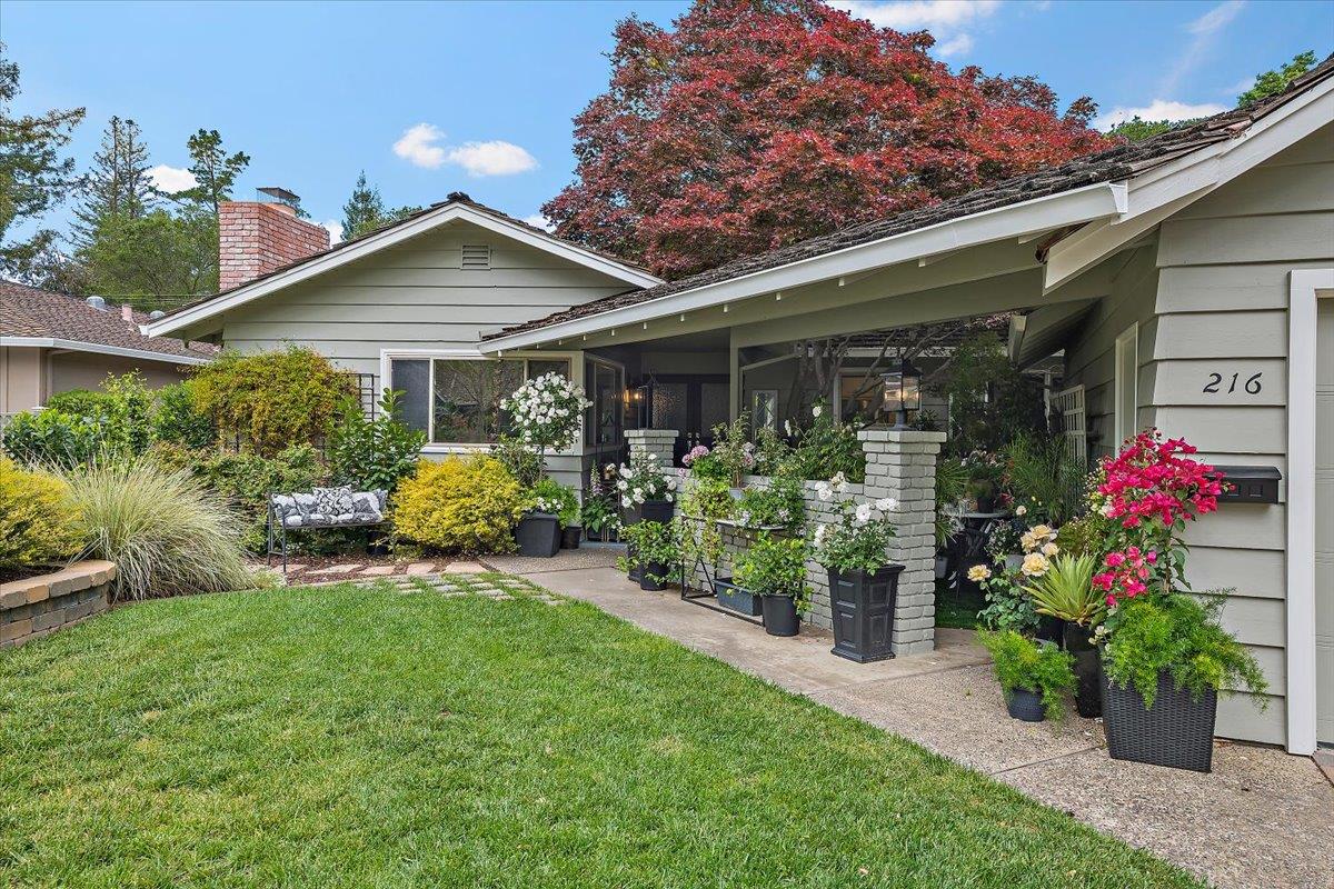 216 Montclair Road Los Gatos, CA 95032 - Photo 2 of 44 a front view of a house with a porch