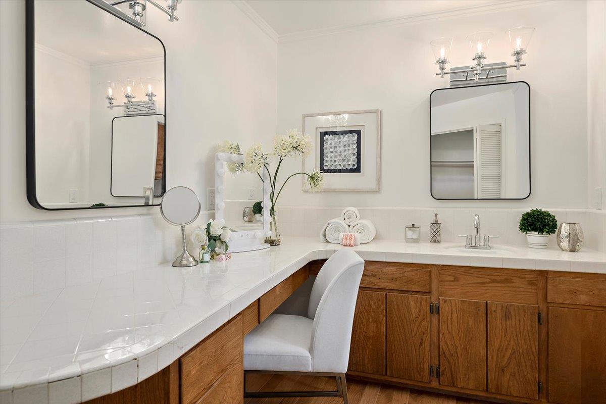 216 Montclair Road Los Gatos, CA 95032 - Photo 22 of 44 a en suite bathroom with a double vanity sink and a mirror