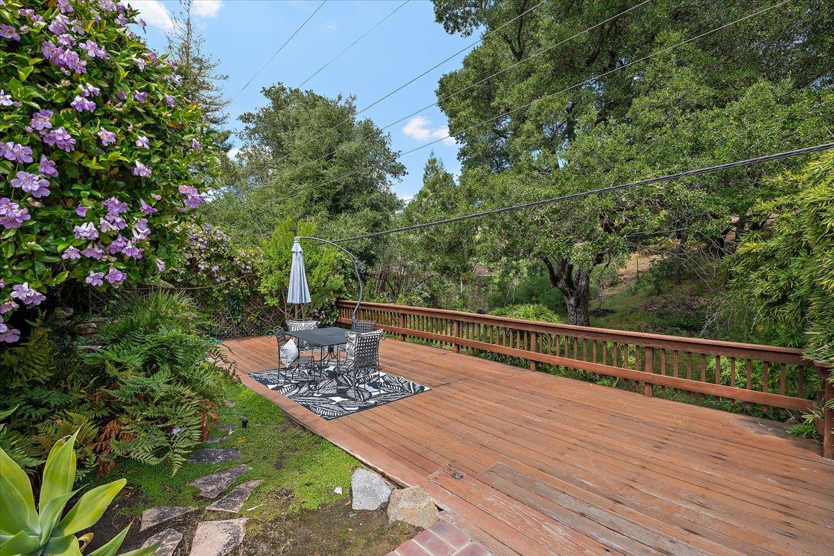 216 Montclair Road Los Gatos, CA 95032 - Photo 25 of 44 a view of a balcony with wooden floor and outdoor seating