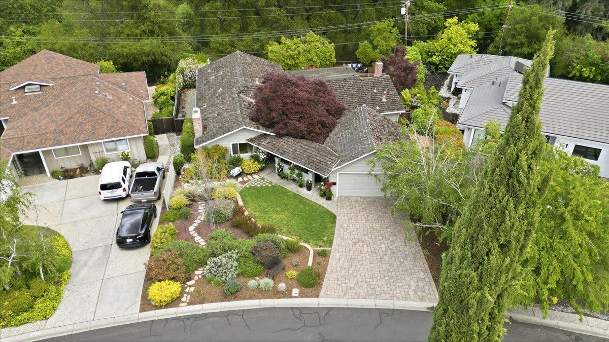 216 Montclair Road Los Gatos, CA 95032 - Photo 28 of 44 an aerial view of a house with garden space and a patio