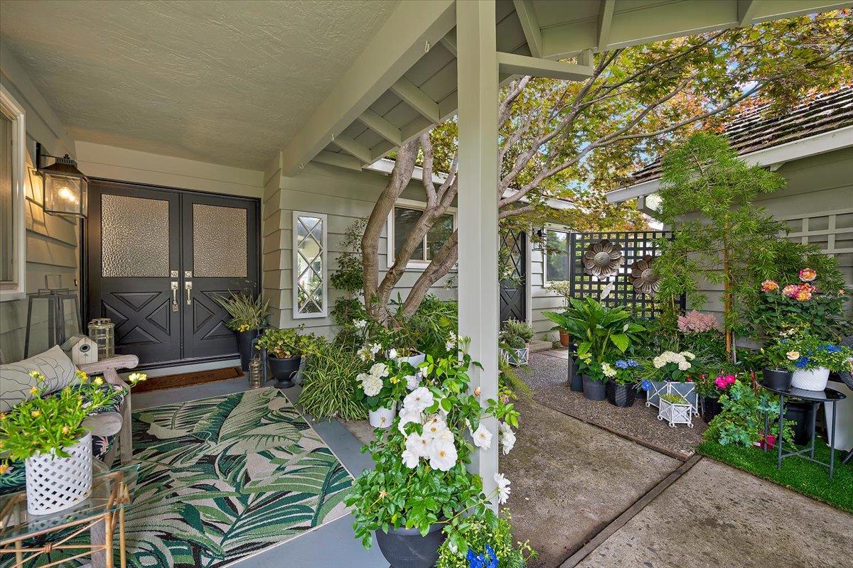 216 Montclair Road Los Gatos, CA 95032 - Photo 3 of 44 a potted plant sitting in front of a house