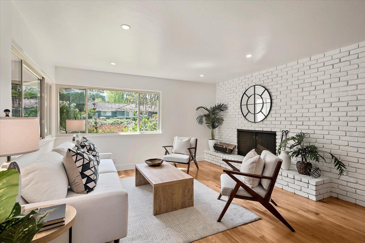 216 Montclair Road Los Gatos, CA 95032 - Photo 5 of 44 a living room with furniture and a large window