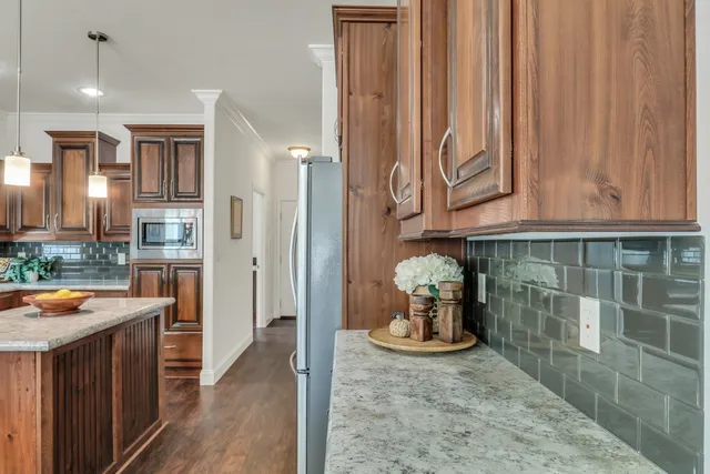 a view of a entryway and kitchen view