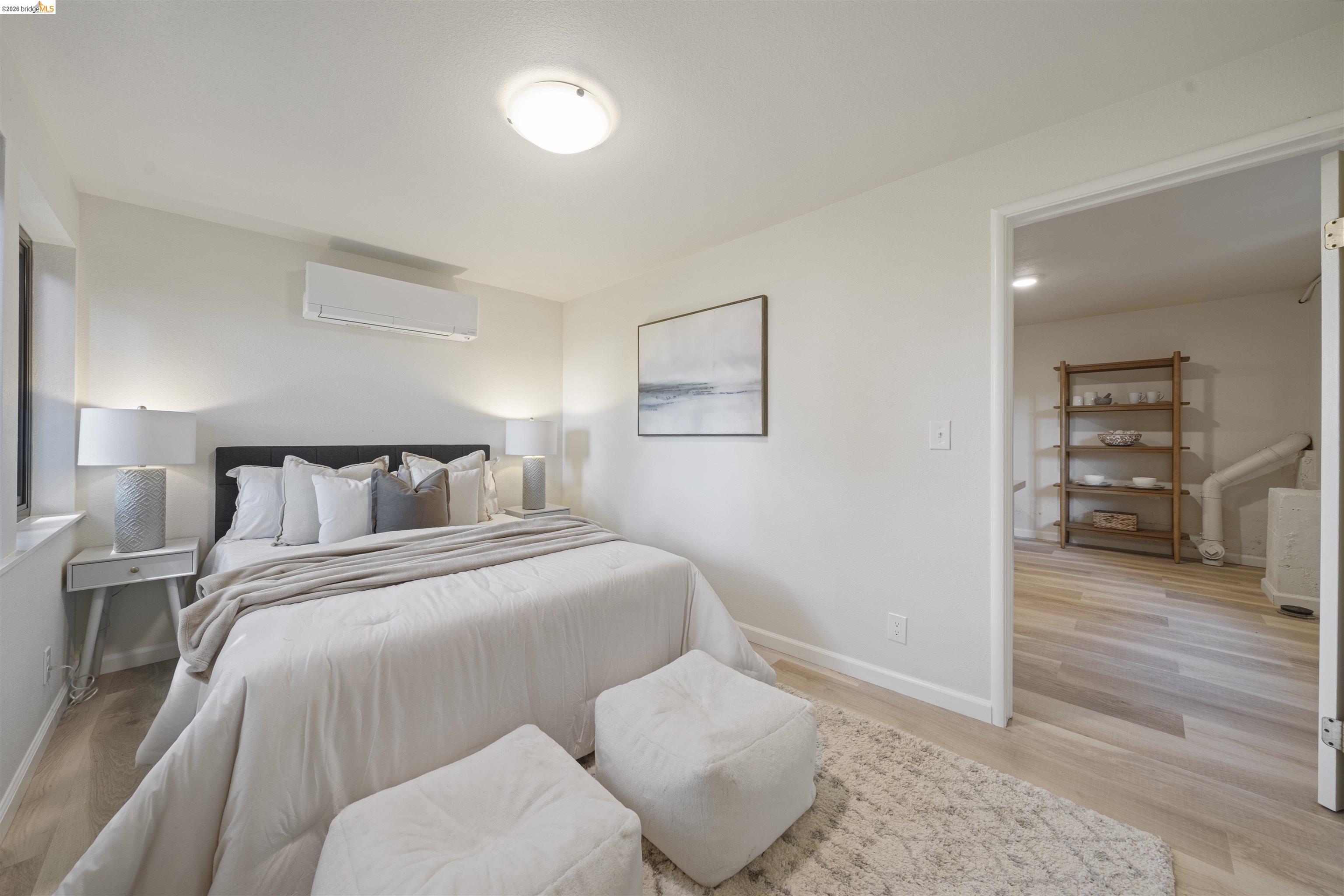 1170 Sterling Avenue Berkeley, CA 94708 - Photo 41 of 52 Bedroom with light wood-type flooring and a wall mounted mini split