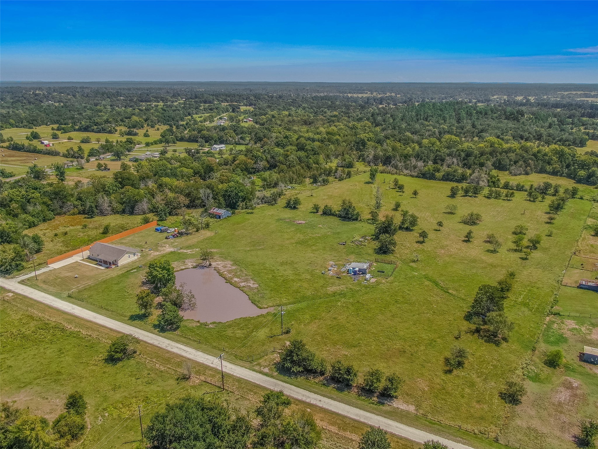 3876 Hummingbird Lane Bedias, TX 77831 - Photo 28 of 29 an aerial view of residential houses with outdoor space