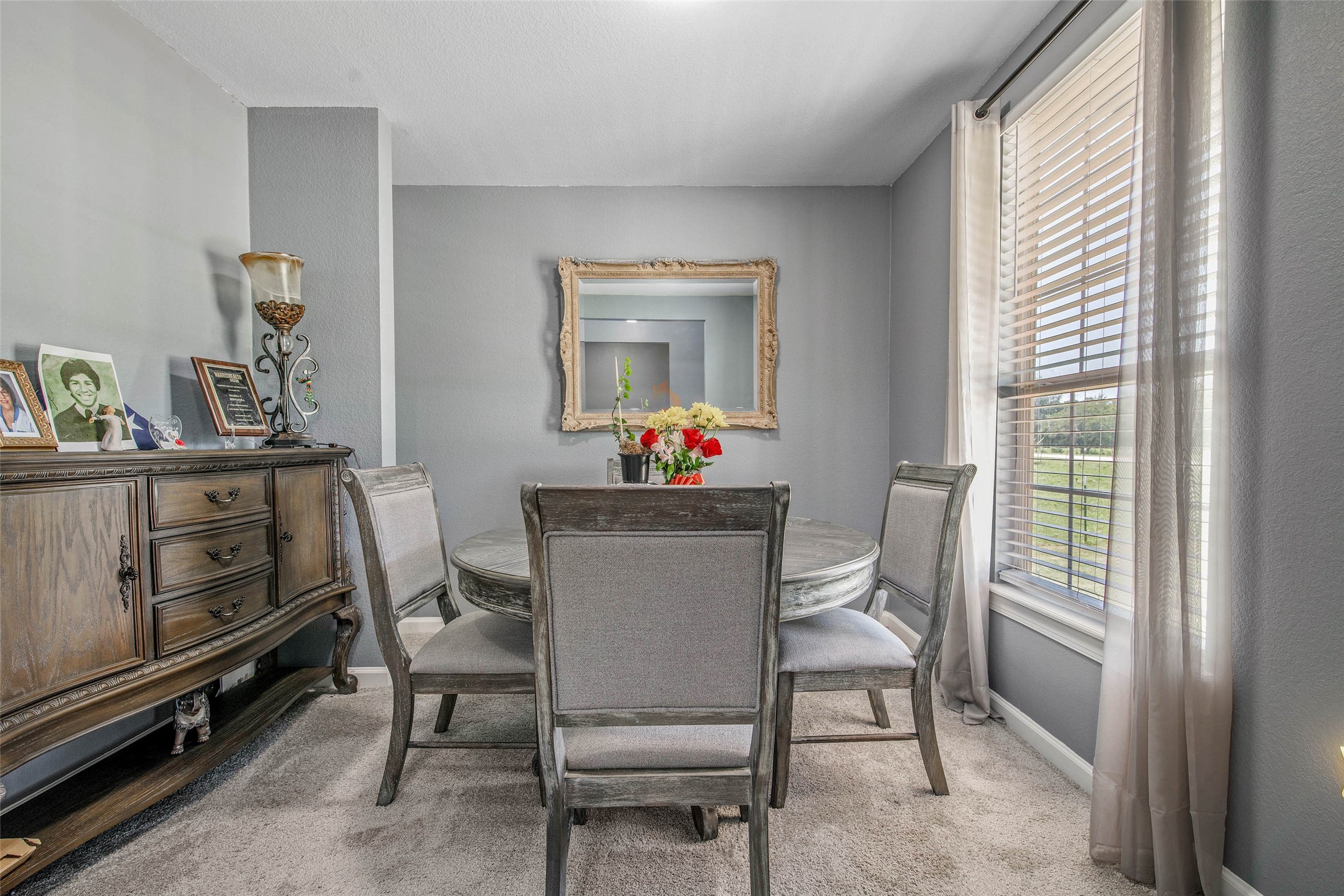 3876 Hummingbird Lane Bedias, TX 77831 - Photo 7 of 29 a dining room with furniture and window