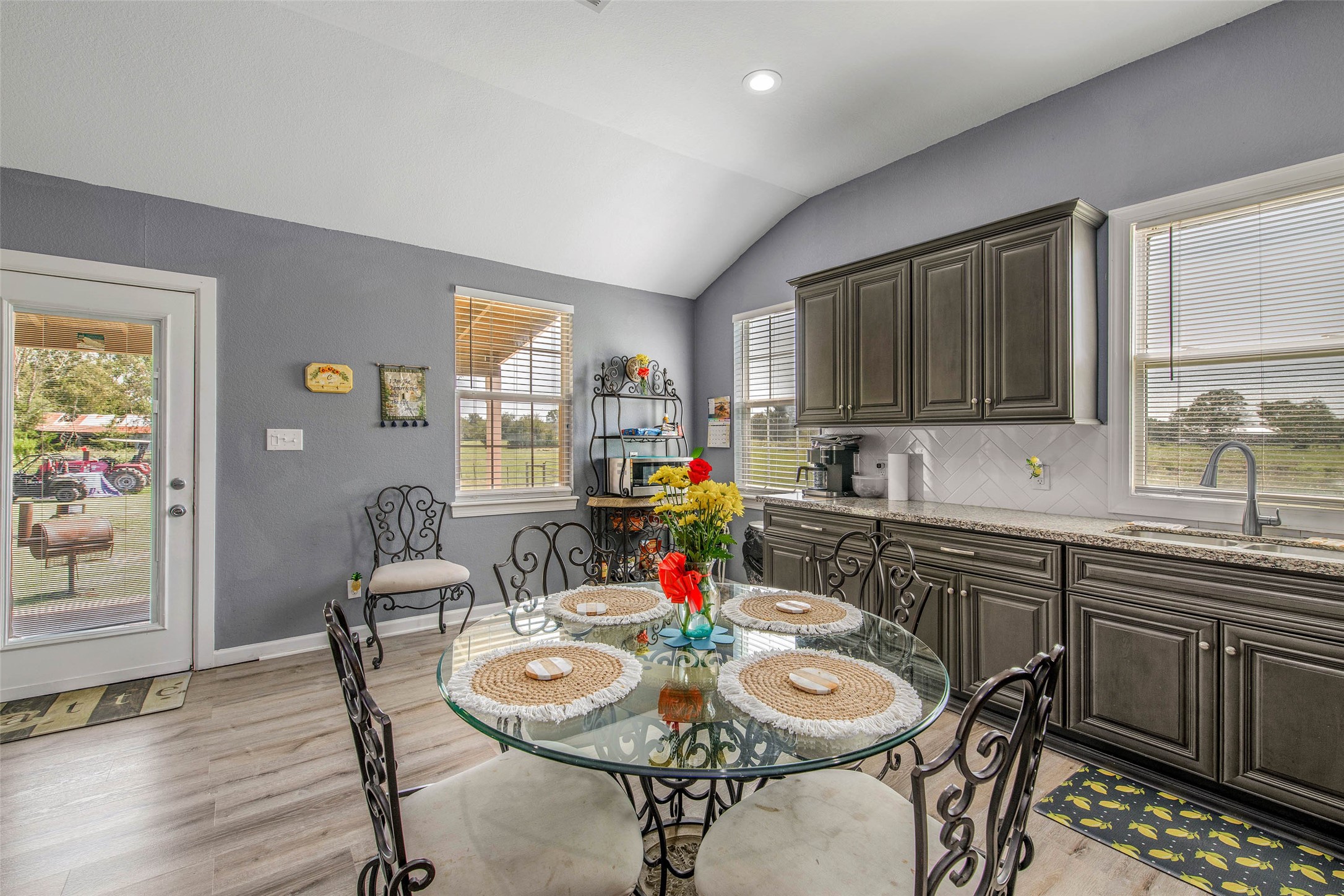 3876 Hummingbird Lane Bedias, TX 77831 - Photo 10 of 29 a view of a dining room with furniture kitchen and wooden floor