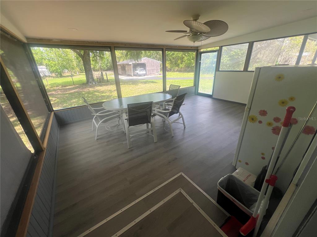 5855 Jack Brack Road St. Cloud, FL 34771 - Photo 81 of 86 a view of a room with furniture and a large window