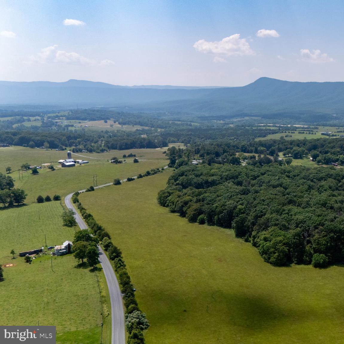 Off Sunnyview Drive Rileyville, VA 22650 - Photo 11 of 37 a view of a lake with mountains in the background