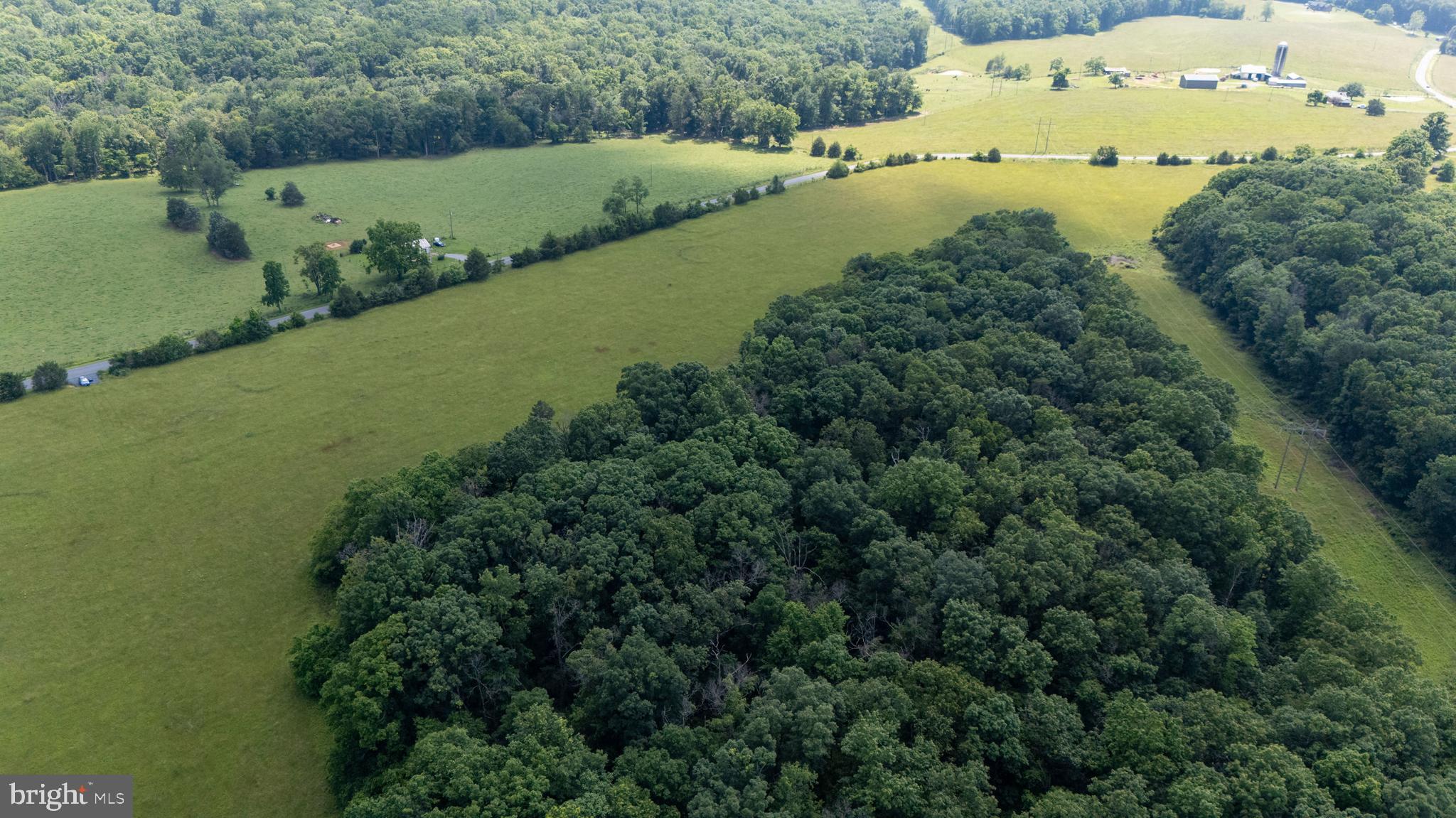 Off Sunnyview Drive Rileyville, VA 22650 - Photo 18 of 37 an aerial view of a house with a yard and lake view