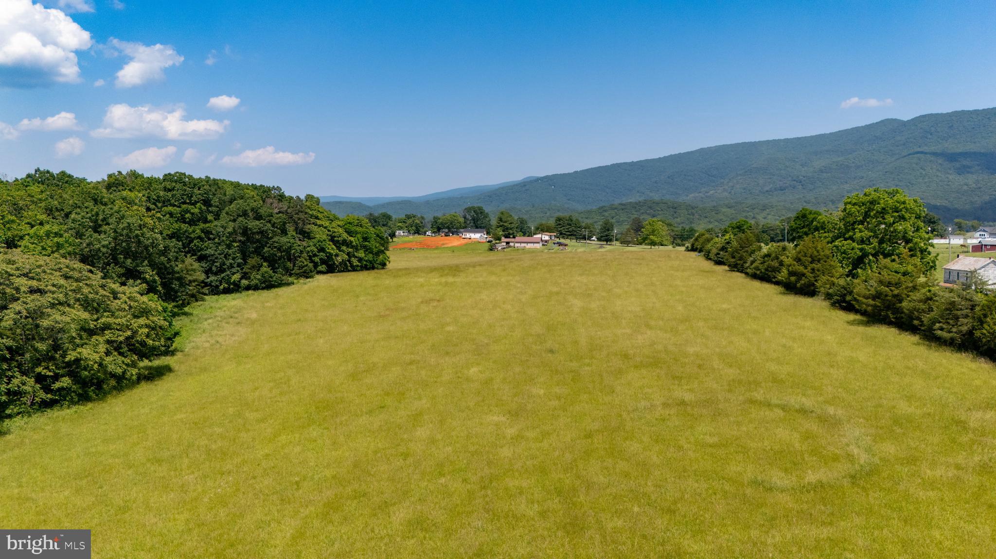 Off Sunnyview Drive Rileyville, VA 22650 - Photo 20 of 37 a view of a big yard with an outdoor space