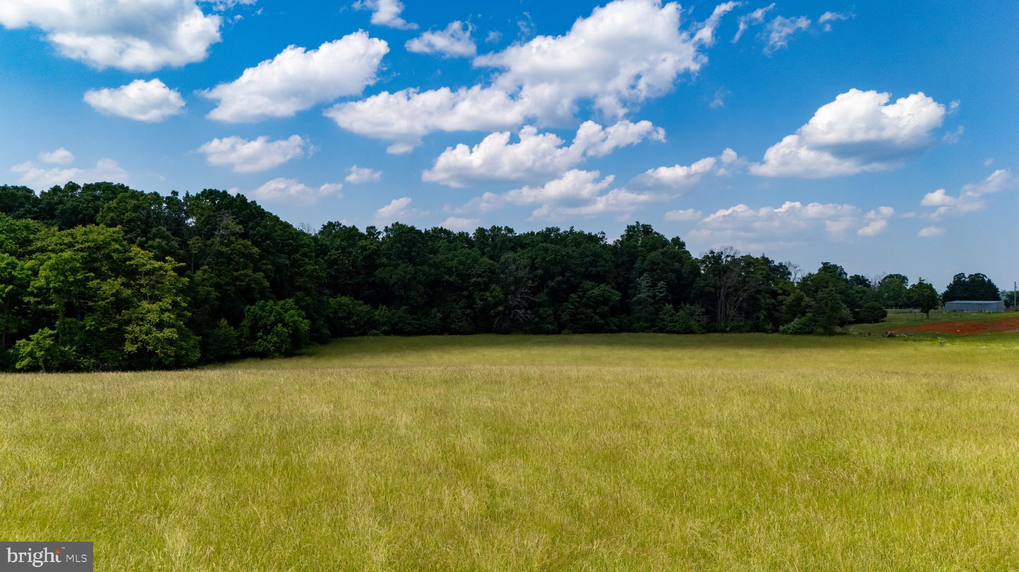 Off Sunnyview Drive Rileyville, VA 22650 - Photo 30 of 37 a view of a swimming pool and an outdoor seating area