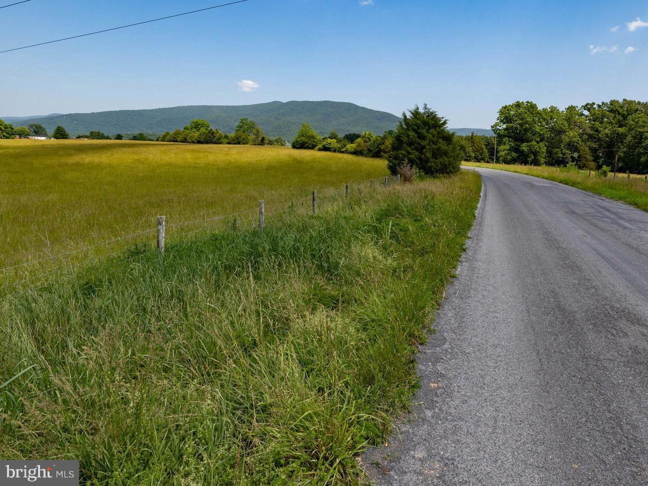 Off Sunnyview Drive Rileyville, VA 22650 - Photo 35 of 37 a view of a lake with a mountain in the background