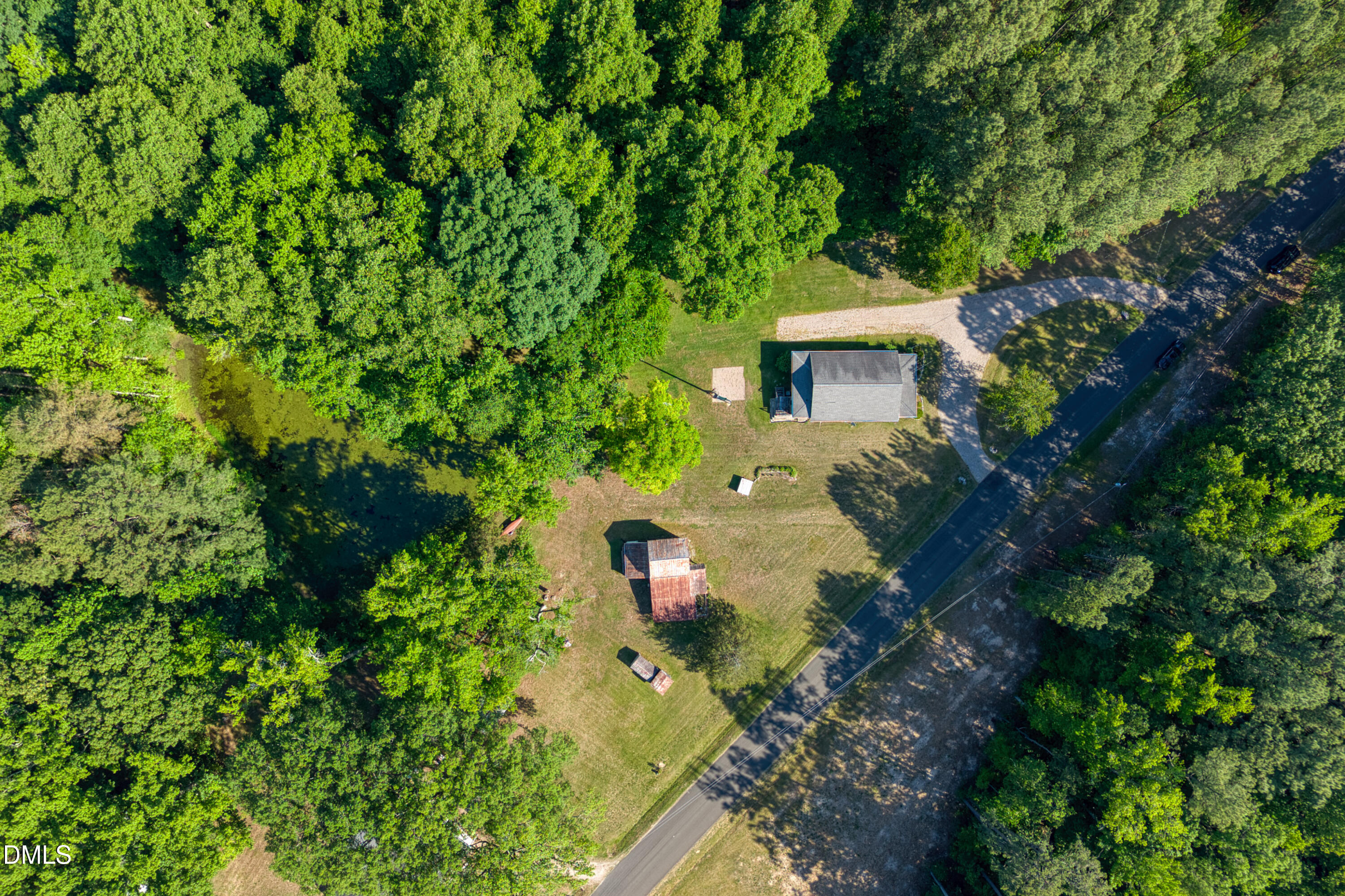 50 Robert Sledge Road Spring Hope, NC 27882 - Photo 42 of 50 a view of a house with a yard