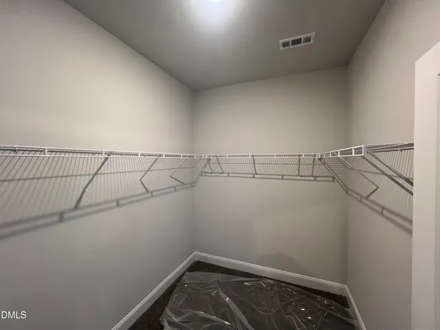 a room with furniture and a window