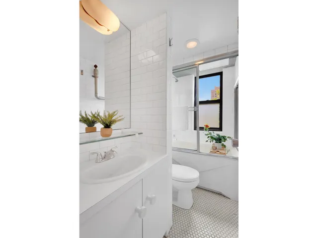 a view of a kitchen with washer and dryer