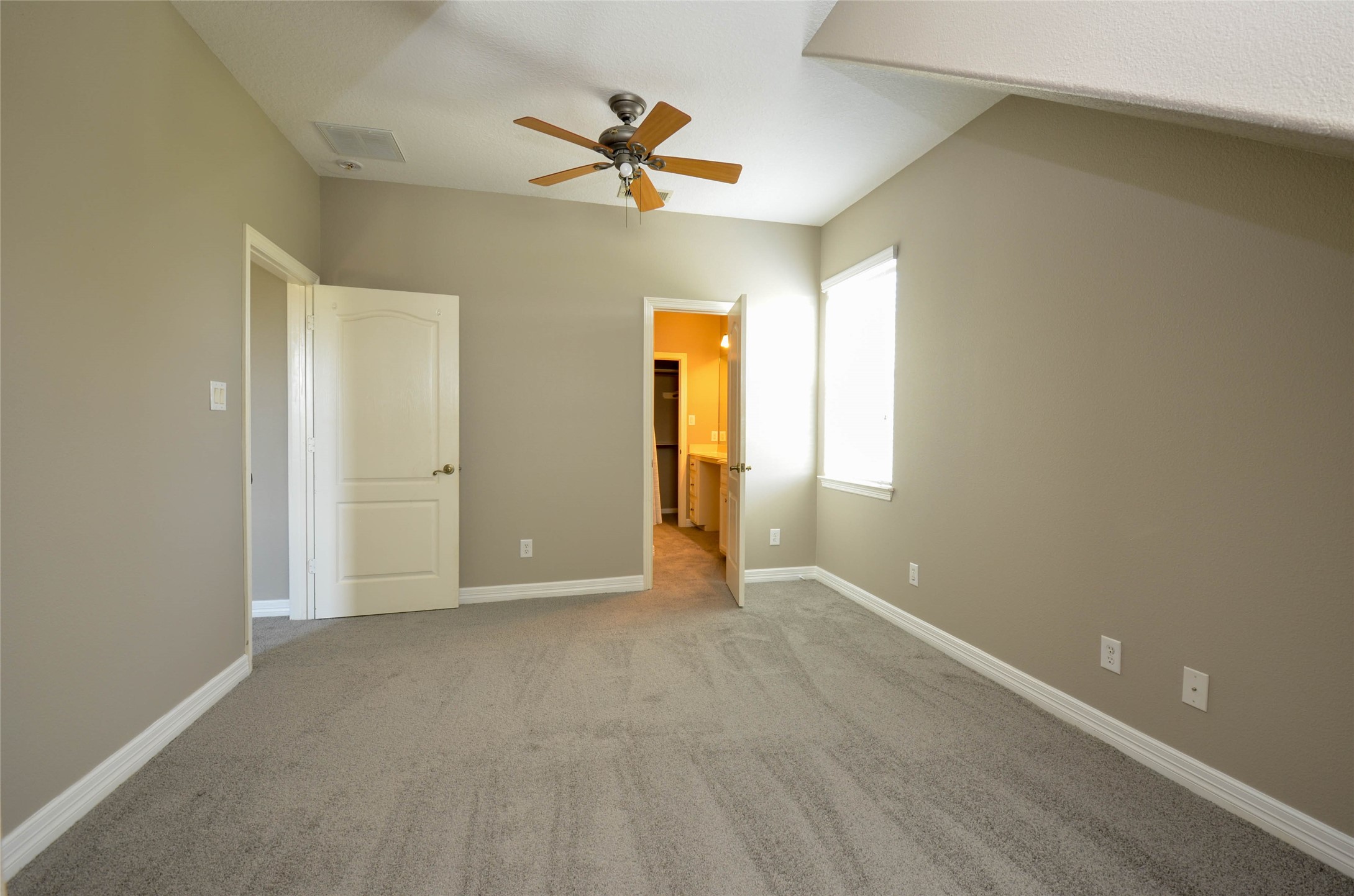 6125 Alleluia Trail Manvel, TX 77578 - Photo 20 of 25 a view of an empty room with a window