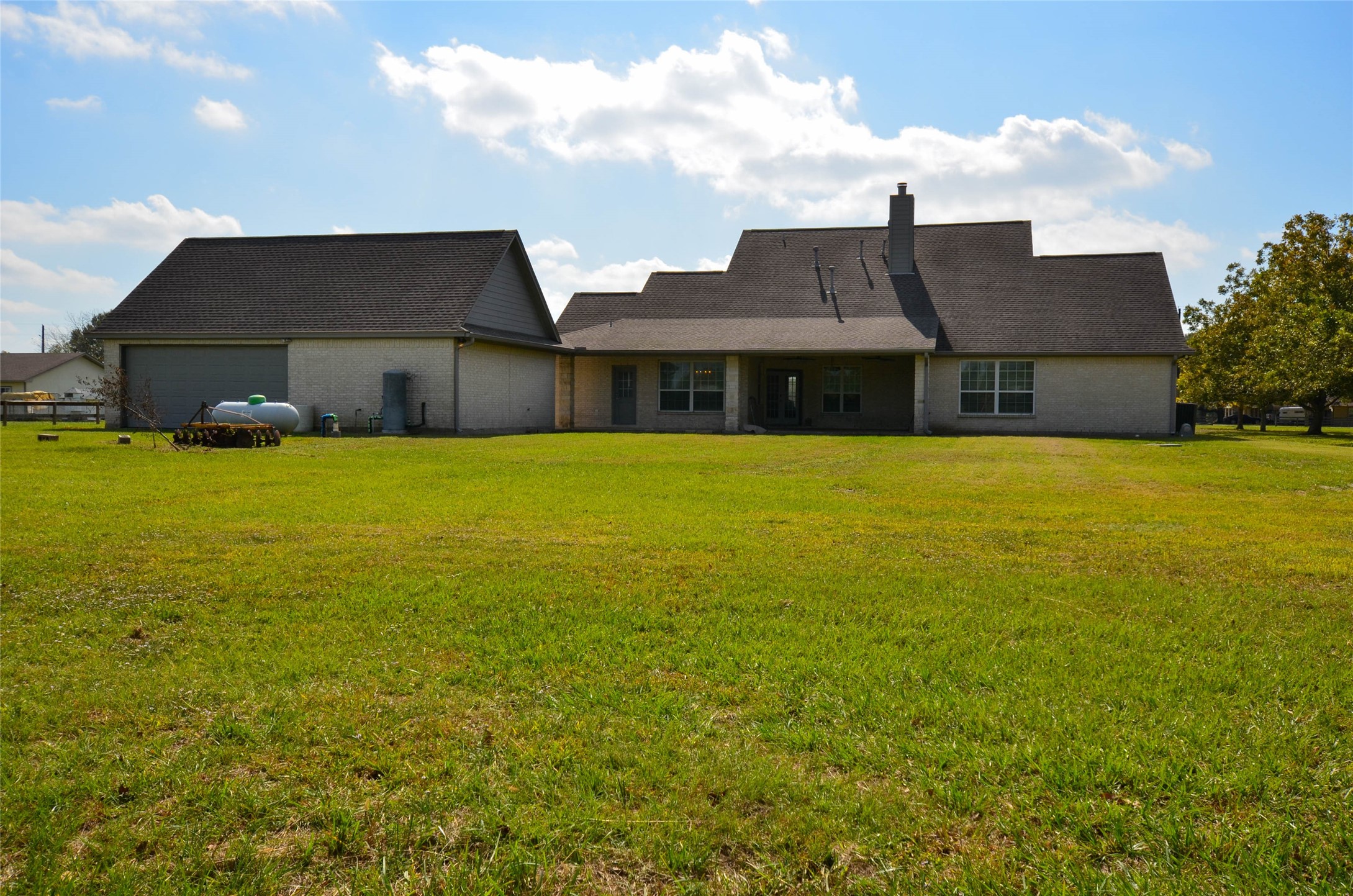 6125 Alleluia Trail Manvel, TX 77578 - Photo 23 of 25 a front view of house with yard and ocean view