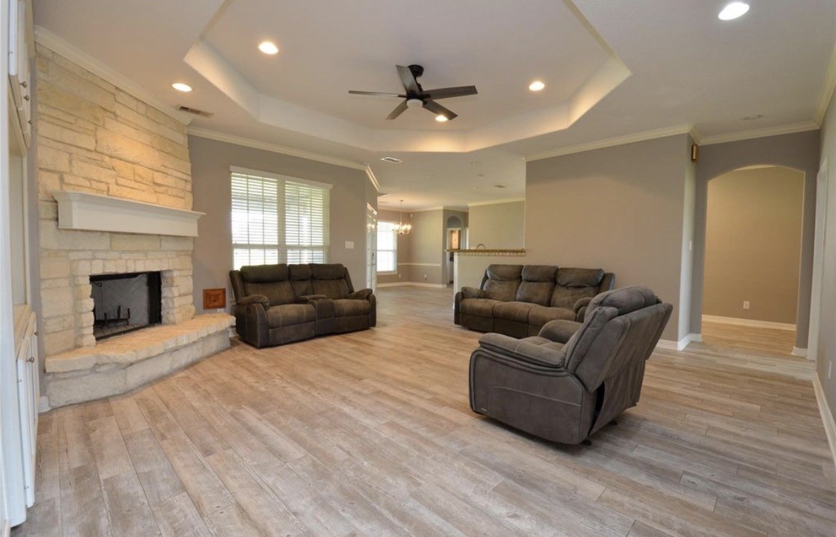 6125 Alleluia Trail Manvel, TX 77578 - Photo 5 of 25 a living room with furniture and a fireplace