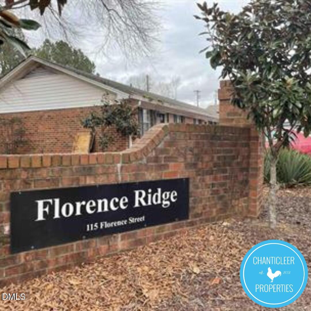 115 Florence Street, Unit 9 Graham, NC 27253 - Photo 14 of 14 a view of a street sign