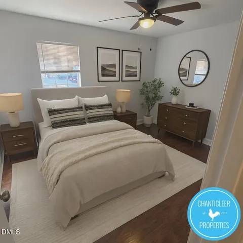 a bedroom with a bed and window