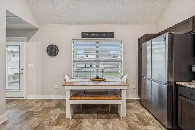 a room with a table and a window