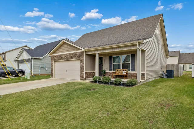 a view of a house with a garden