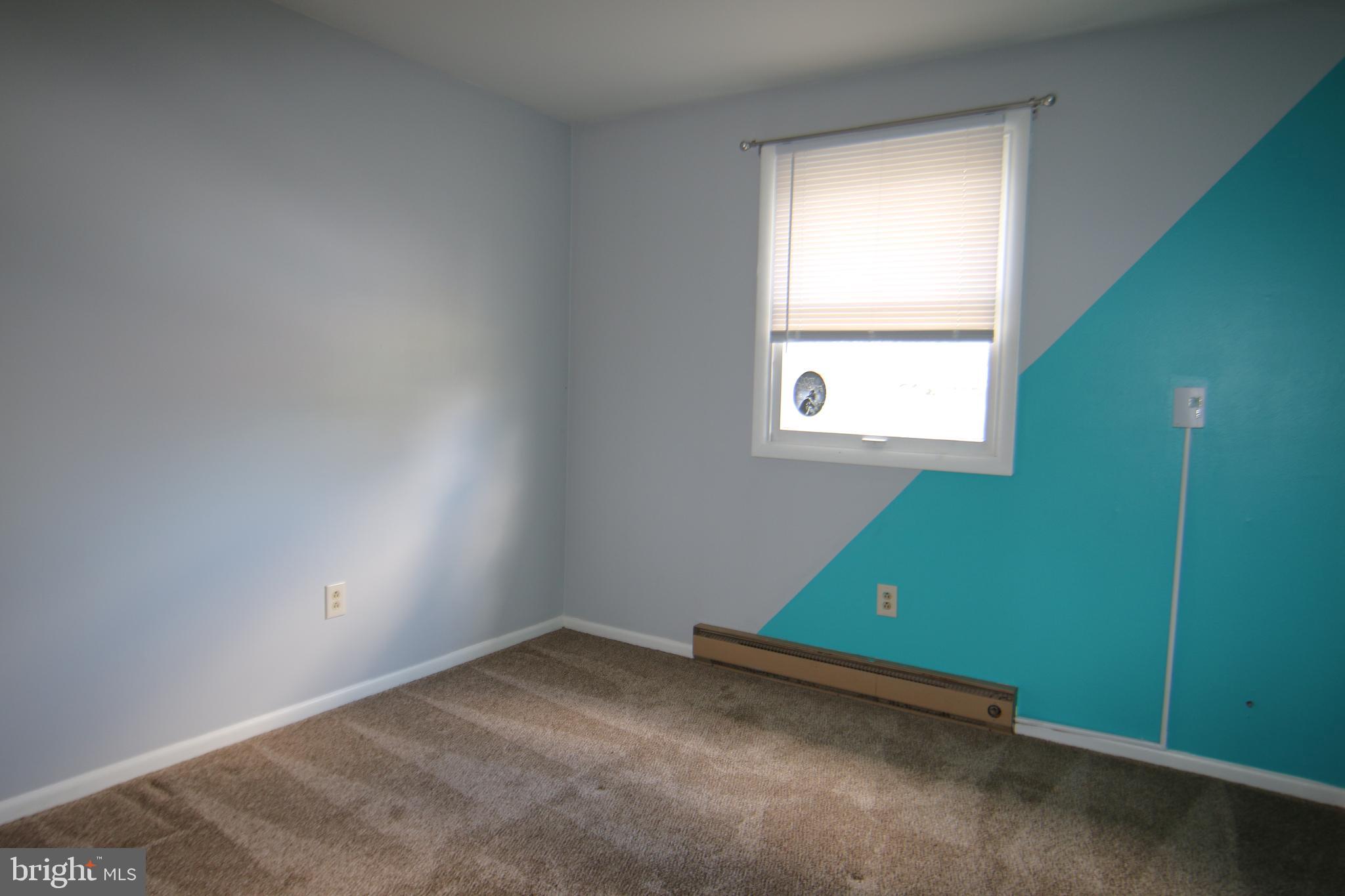 2121 Market St Extension Middletown, PA 17057 - Photo 11 of 19 an empty room with a window