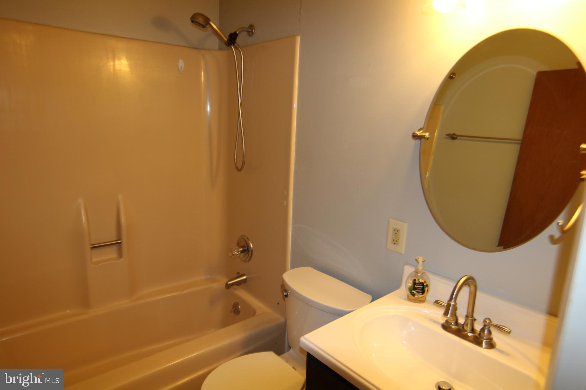 2121 Market St Extension Middletown, PA 17057 - Photo 12 of 19 a bathroom with a sink toilet and shower