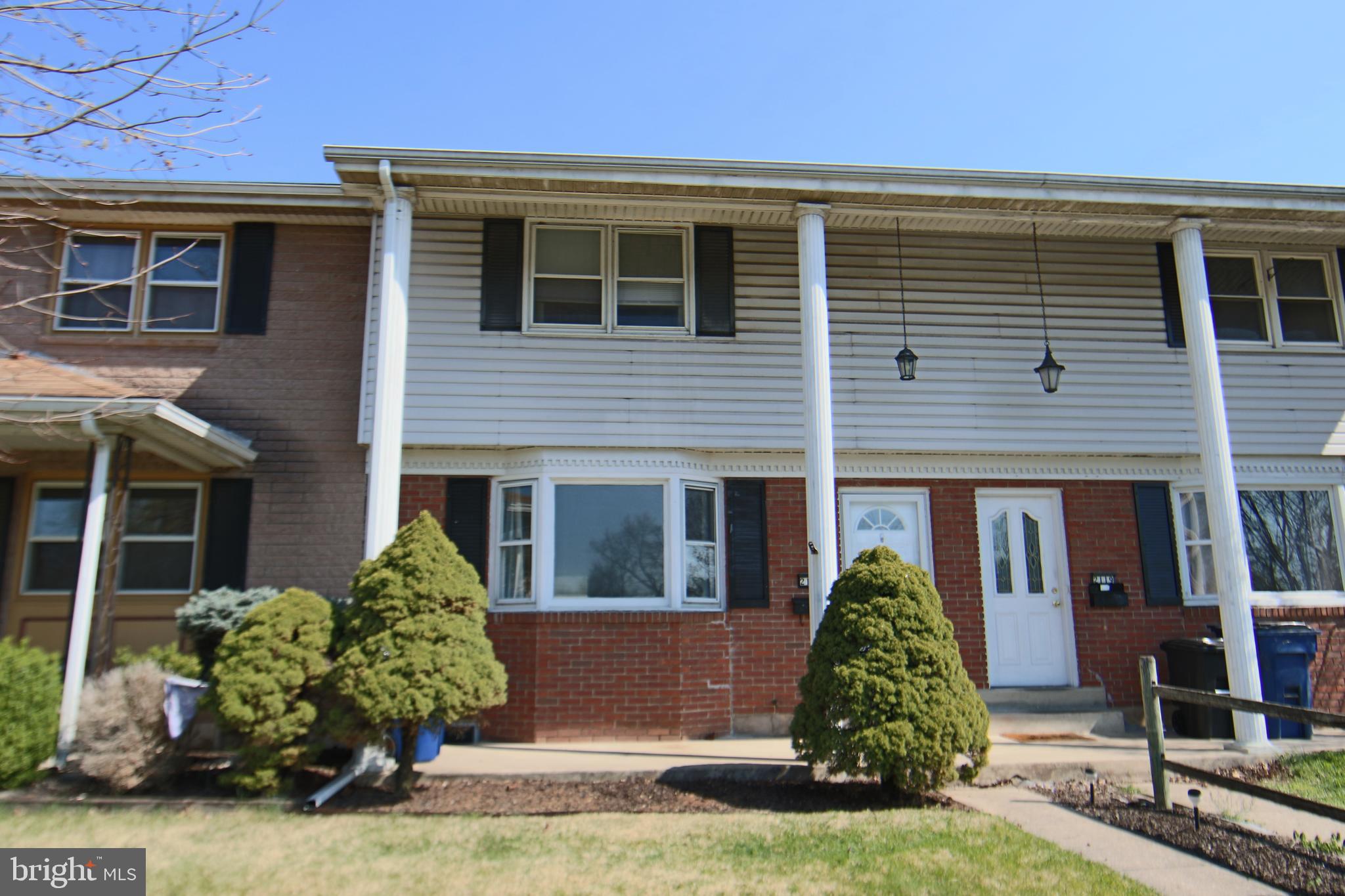 2121 Market St Extension Middletown, PA 17057 - Photo 2 of 19 a front view of a house with garden