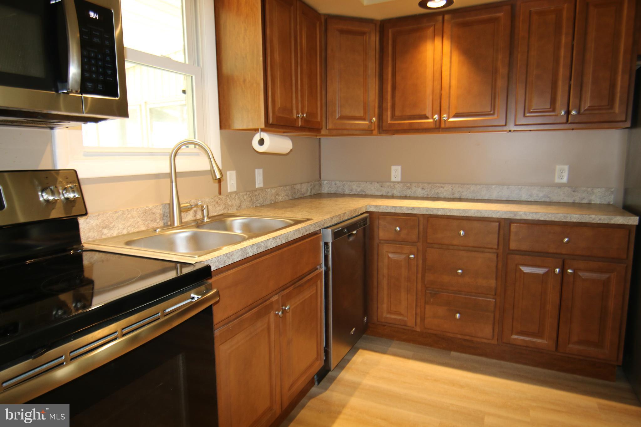 2121 Market St Extension Middletown, PA 17057 - Photo 5 of 19 a kitchen with a sink and cabinets
