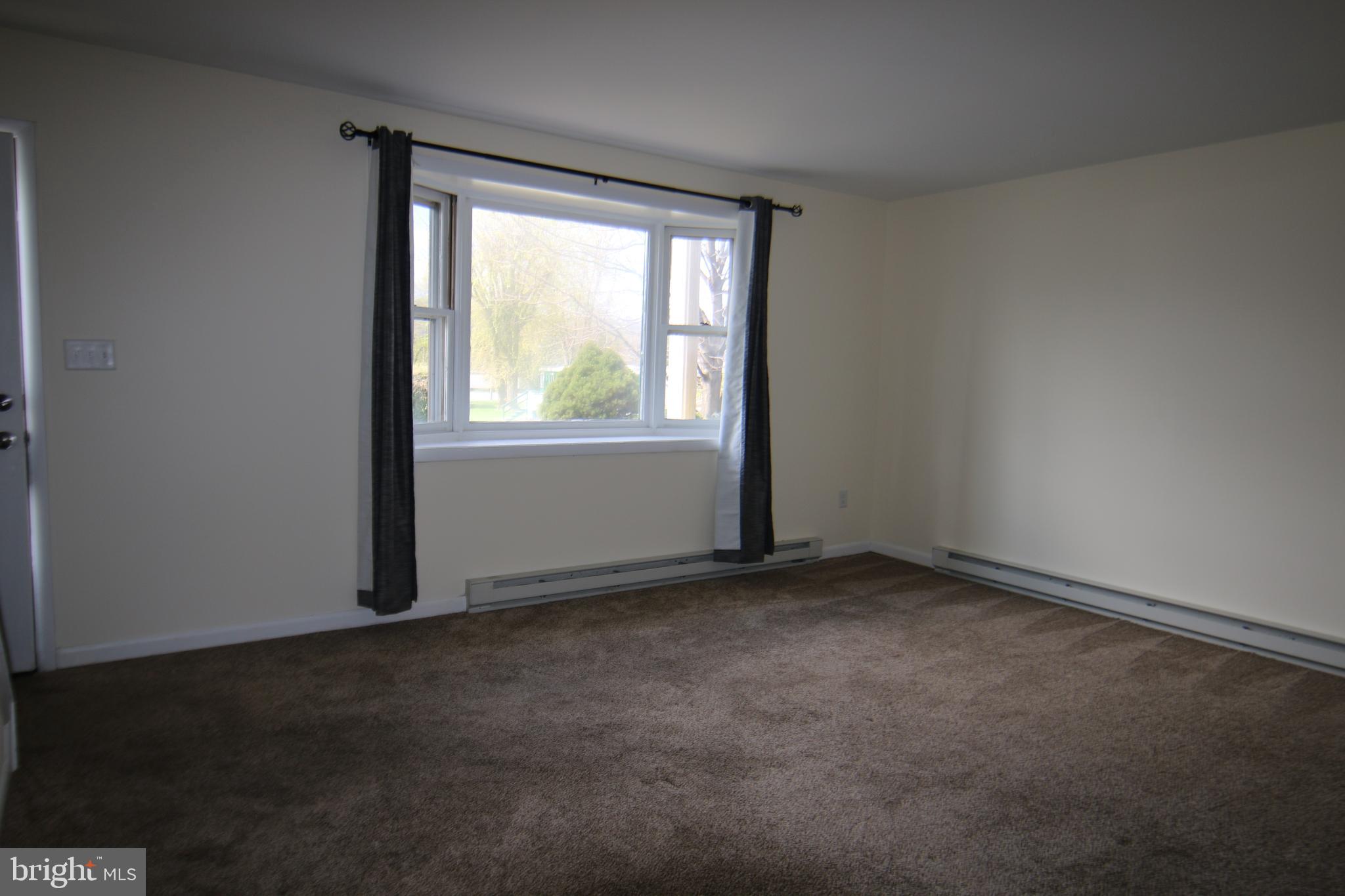 2121 Market St Extension Middletown, PA 17057 - Photo 7 of 19 an empty room with a window