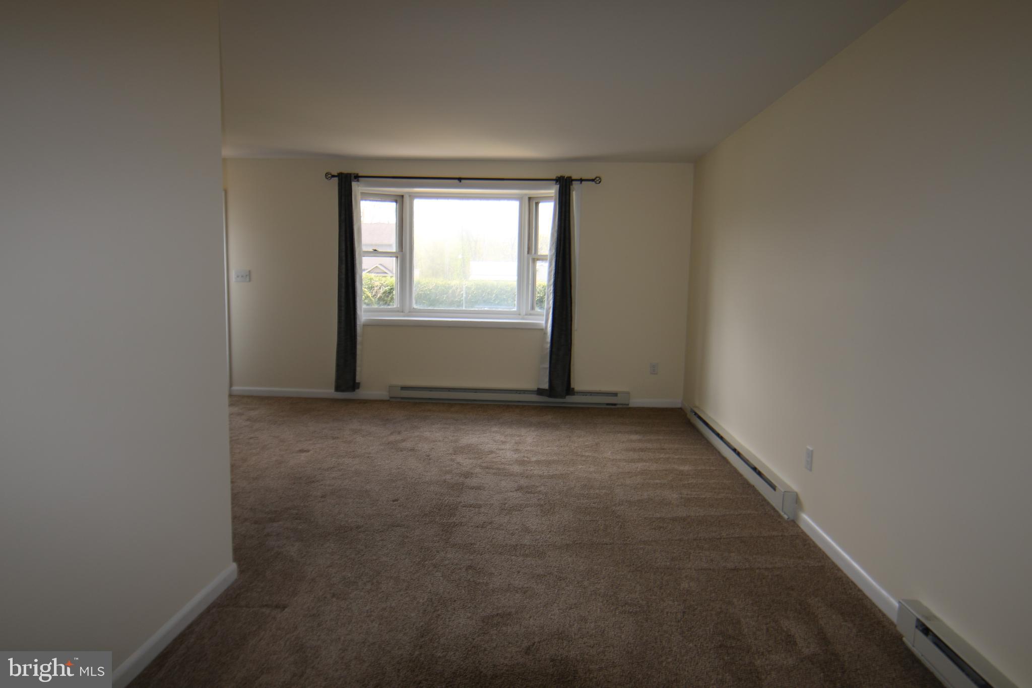2121 Market St Extension Middletown, PA 17057 - Photo 8 of 19 an empty room with a window